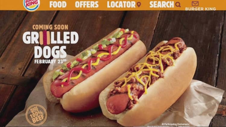 When Did Burger King Introduce Hot Dogs To Their Menu?